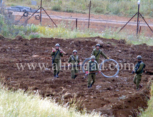 Photo Report: “Israeli” Enemy Crosses Border Fence, Installs Barbed Wires -Abbasiyeh Village