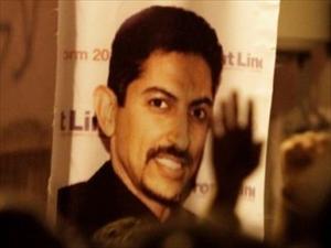 Al-Khawaja Triumphant whether free or martyr: Wife