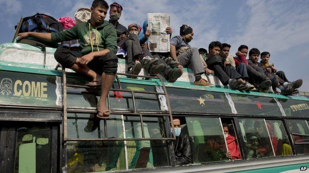 Nepalese leaving destructed areas
