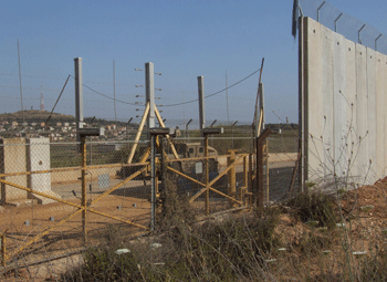 “Israeli’ Protection Barrier Needs Further Protection, “Israeli” Soldiers Guarding Wall at Kafarkila Village