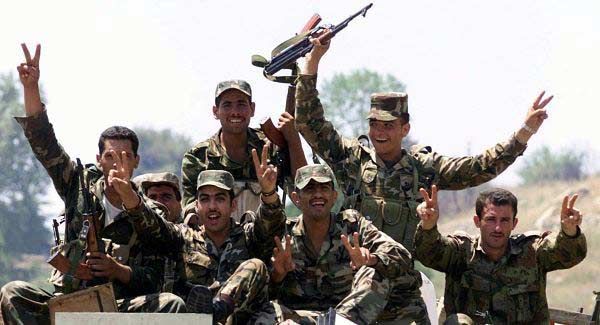 Syrian soldiers making victory sign Saudi Arabia: Damages Restoration...Turkey: The Biggest Loser