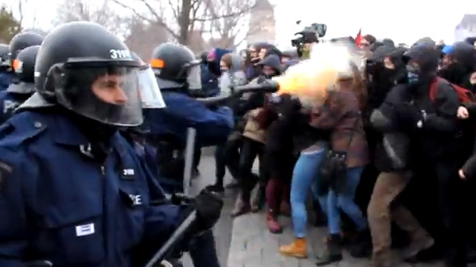 Canadian Cops Fire Tear Gas at Student Protesters' Faces 