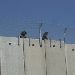 “Israeli’ Protection Barrier Needs Further Protection, “Israeli” Soldiers Guarding Wall at Kafarkila Village 