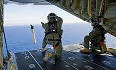 Wild Weather Halts Search, Malaysia: Missing Jet Crashed at Sea