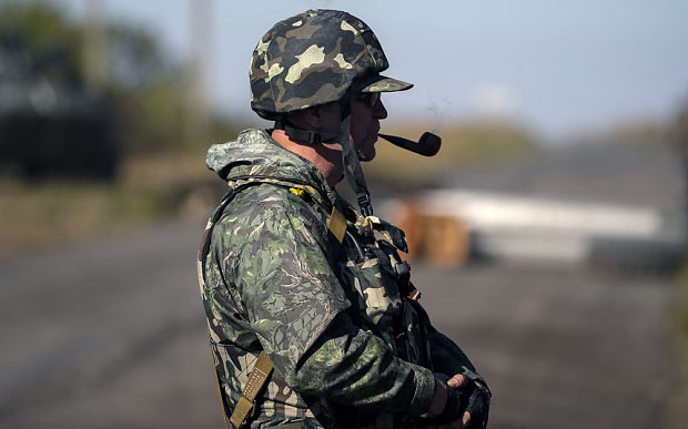 Ukraine Truce Takes Hold as West Lines Up Russia Sanctions