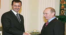 Putin Reaffirms Support for Al-Assad, Calls for ’Political Change’