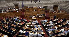 Greek Parliament Approves Bailout after All-Night Debate

