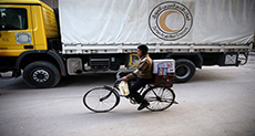 UN Sends Aid to Syria, Turkey Calls for Ground Operation
