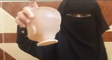 Shocking Video of Young Daesh Girl-Soldier Beheads Doll with Knife
