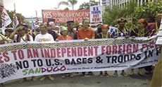 Police Teargas Demonstrators at US Embassy in Manila