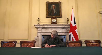 UK’s May to Formally Set Brexit in Motion