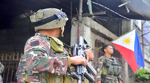 Marawi Siege: Philippine Troops Raise Flag as Bombs Fall