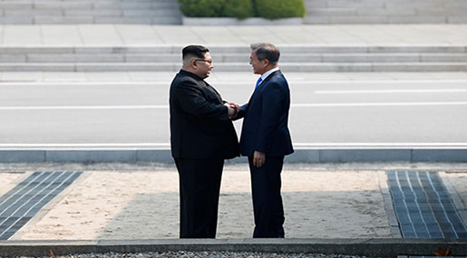 North Korea’s Kim Shakes Hands with Moon, Tells Him Missile Tests Will No Longer Interrupt His Sleep