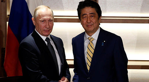 Russian President Vladimir Putin meets Japanese PM Shinzo Abe