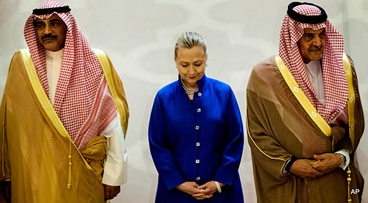 Saudi Foreign Minister Prince Saud Al-Faisal, right, U.S. Secretary of State Hillary Clinton, center, and Kuwaiti Foreign Minister Sheikh Sabah Khaled al-Hamad Al-Sabah, left, stand together prior to a group photo before a US- Gulf Cooperation Council forum at the Gulf Cooperation Council Secretariat in Riyadh, Saudi Arabia, Saturday, March 31, 2012.