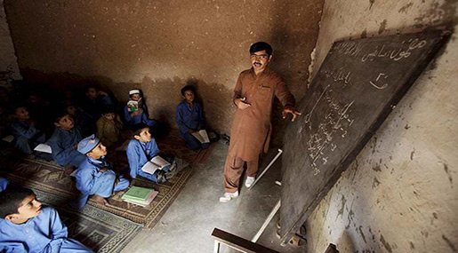 Afghan children learning at a refugee camp