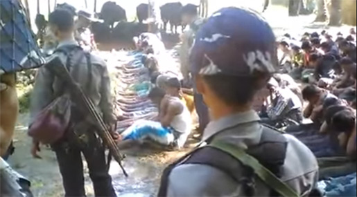 Myanmar police detaining Rohignyan civilians 