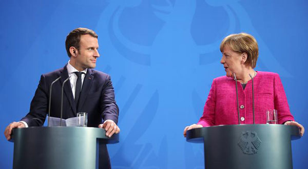 Macron Meets Merkel: Changing EU Treaty ‘Not Taboo' For France Anymore