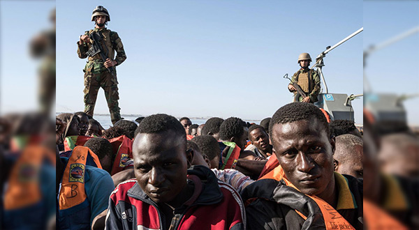 Libyan migrants and coastguards