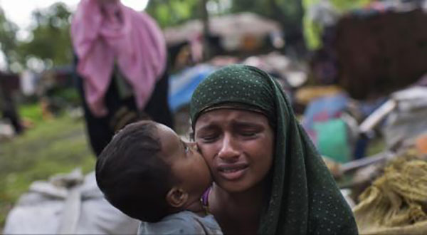 Genocide of Rohingya Muslims by Myanmar army and Buddhist vigilantes Genocide of Rohingya Muslims by Myanmar Army and Buddhist Vigilantes