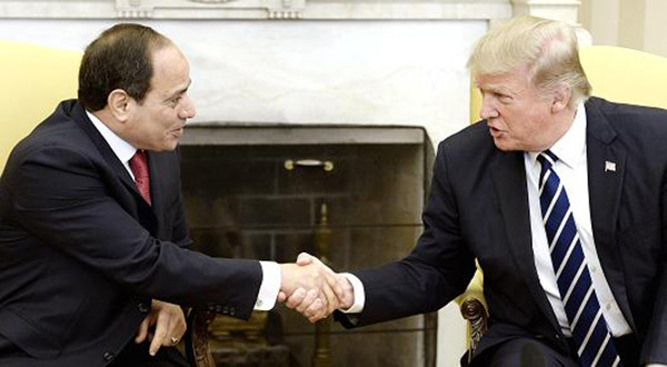 US President Donald Trump shakes hands with Egyptian President Abdel Fattah Al-Sisi