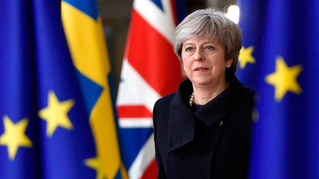 May Vows to Fight on, Warning Brexit Is in Peril