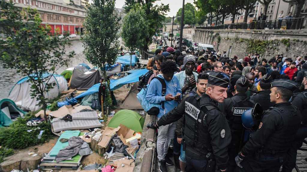 France: Police Evacuate Some 500 Migrants from Camp North of Capital