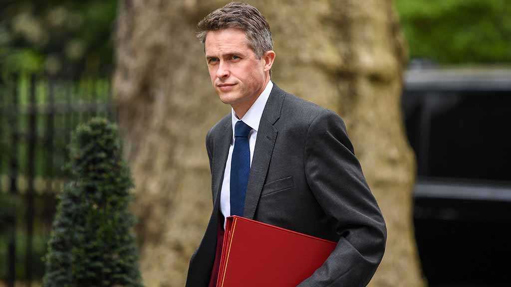 May Fires UK Defense Minister Williamson over Huawei Leak