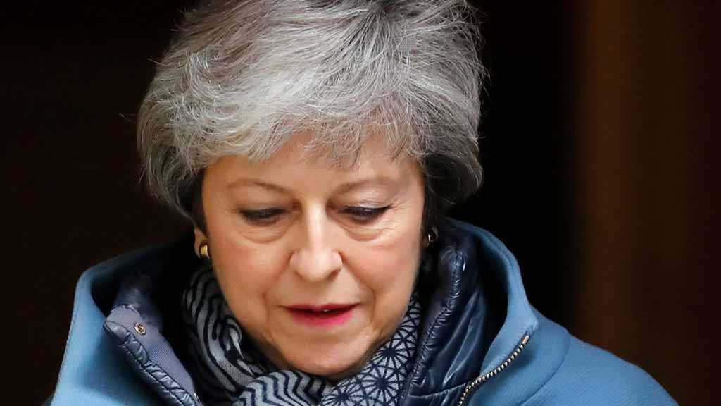 May Faces Coup in Her Party over Agreeing on Brexit Deal with Labor