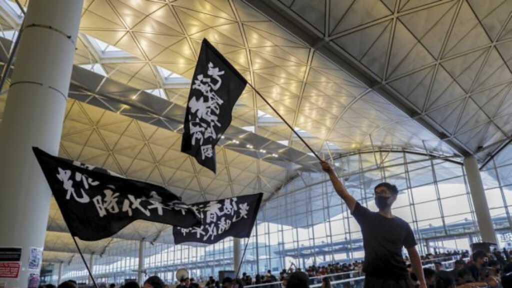 Hong Kong Crisis: Airport Struggles to Reopen, US Announces Support for Protestors  