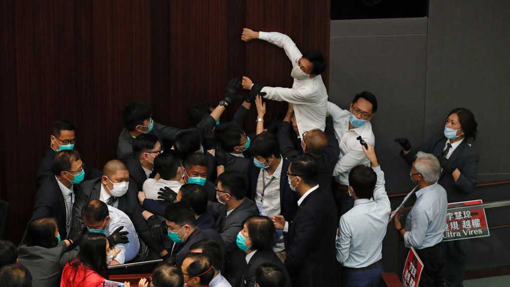 Hong Kong Legislature Descends Into Chaos as Lawmakers Brawl