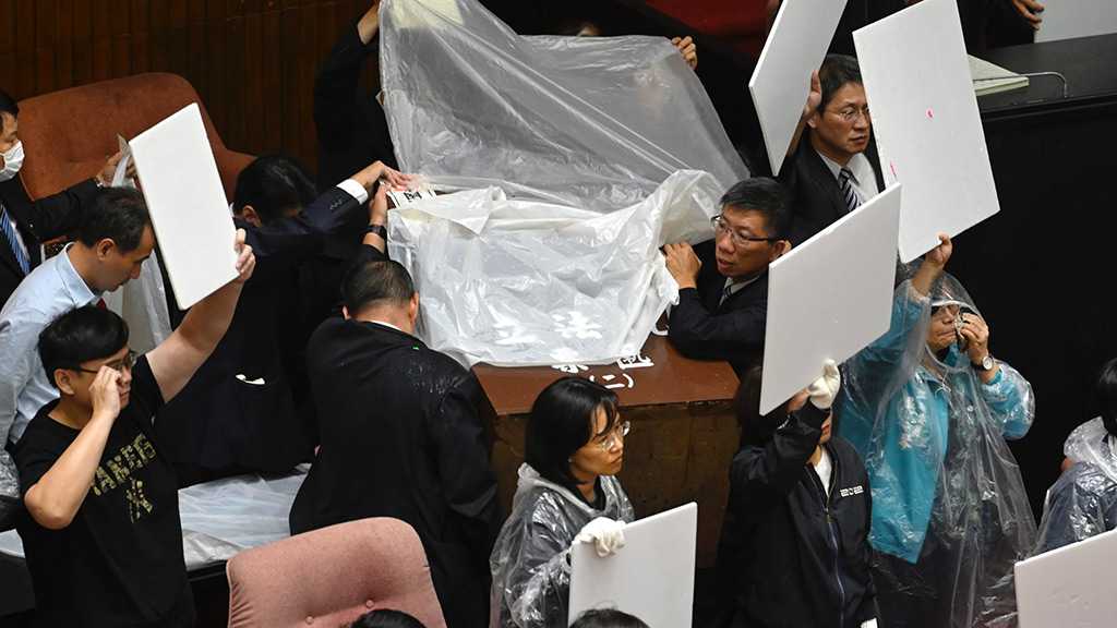 Punches, Water Balloons Thrown in Taiwan Parliament Melee