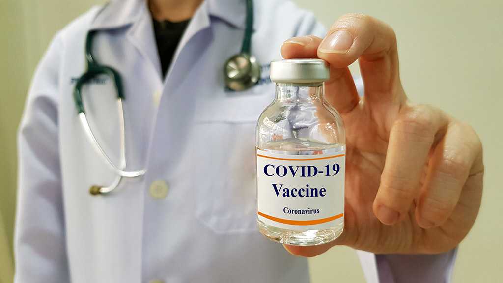 UK Scientists Say First COVID Vaccine Unlikely to Stop People Catching Virus