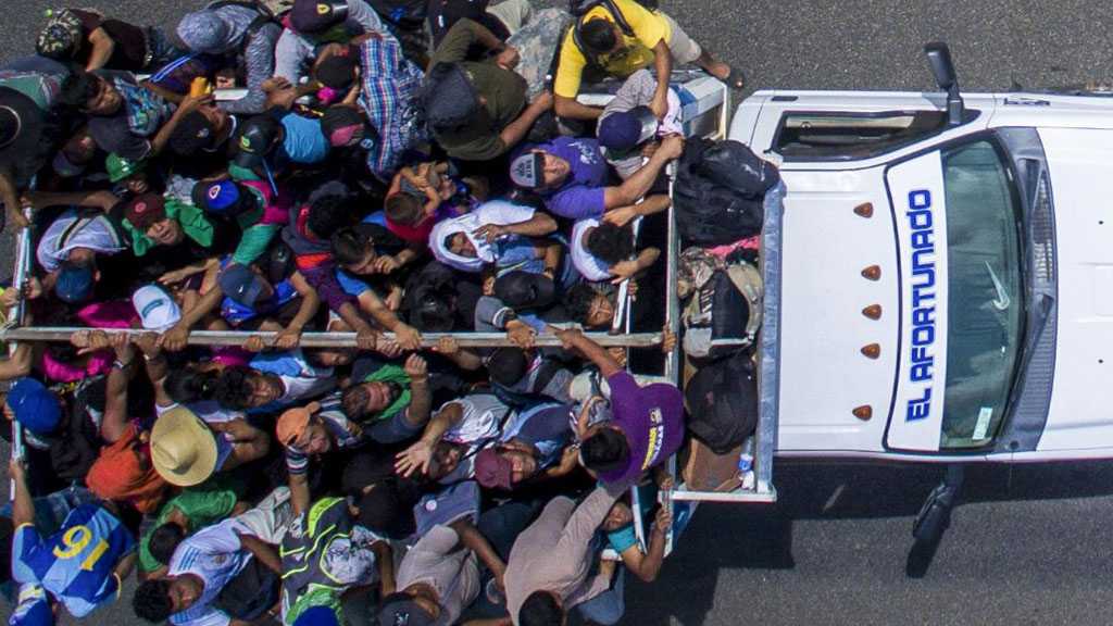 Three Trucks Packed with Hundreds of Migrants Stopped in Mexico
