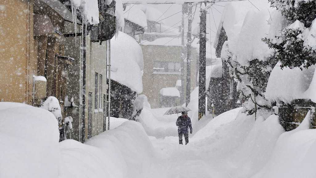 Parts of Northern, Western Japan Buried Under Heavy Snow