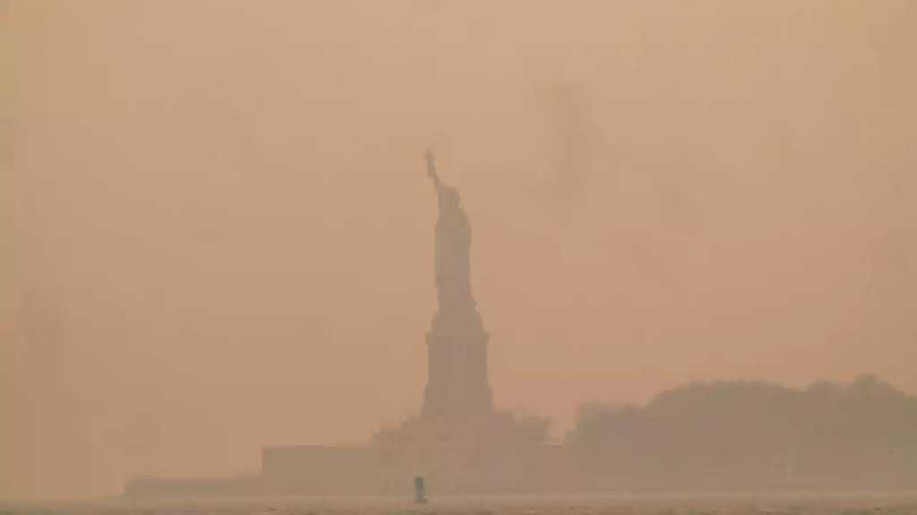 US East Coast Blanketed in Eerie Veil of Smoke from Canada Fires
