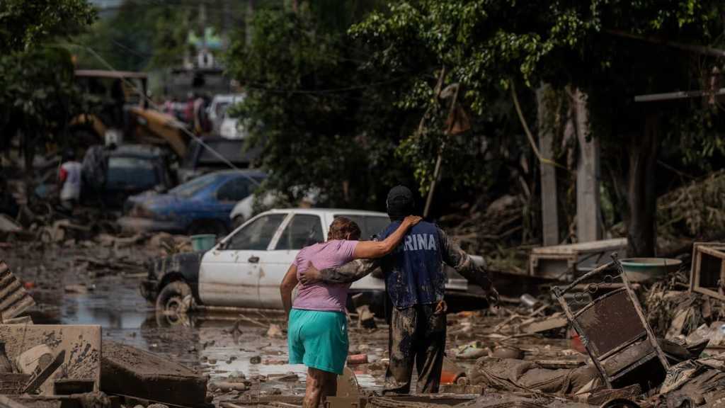 At Least 64 Dead, 65 Missing After Torrential Rains in Mexico