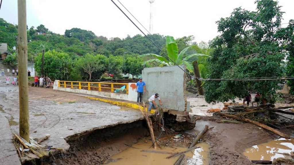 At Least 64 Dead, 65 Missing After Torrential Rains in Mexico