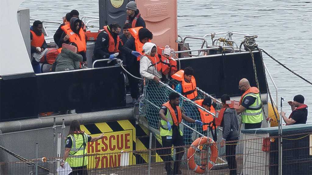 UK May Seize Asylum Seekers’ Assets to Offset Costs