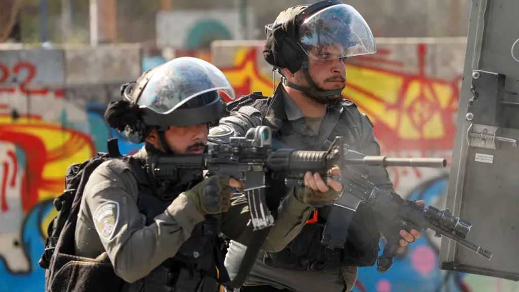 “Israeli” Forces Martyr Palestinian Youth, Conduct Mass Arrests in Expanding West Bank Raids