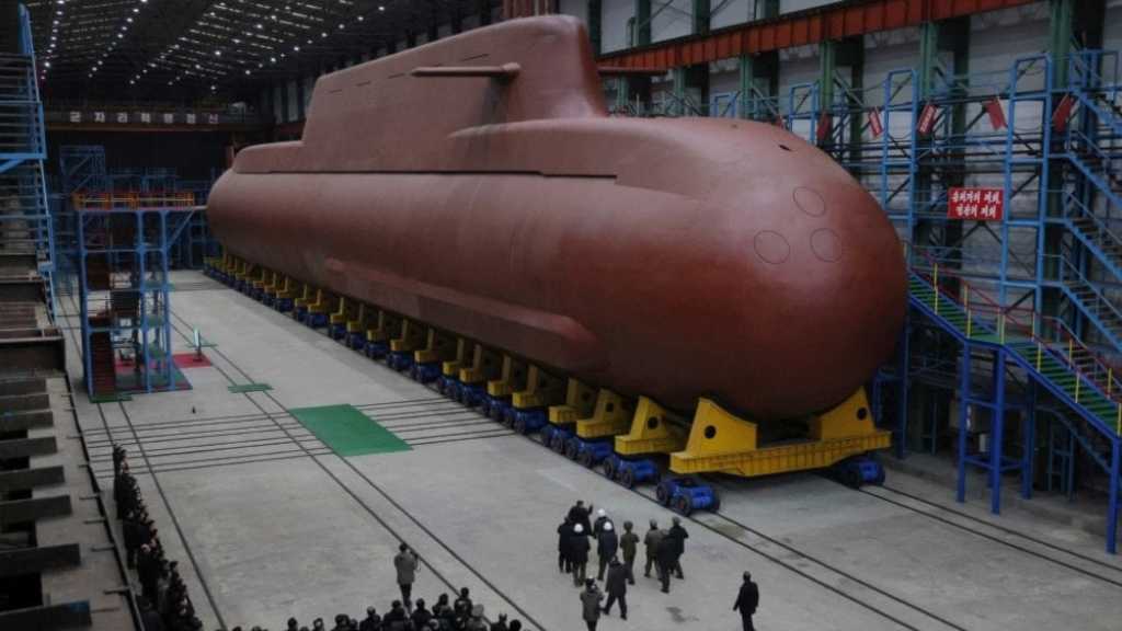 Kim Reviews Construction of Nuclear Submarine