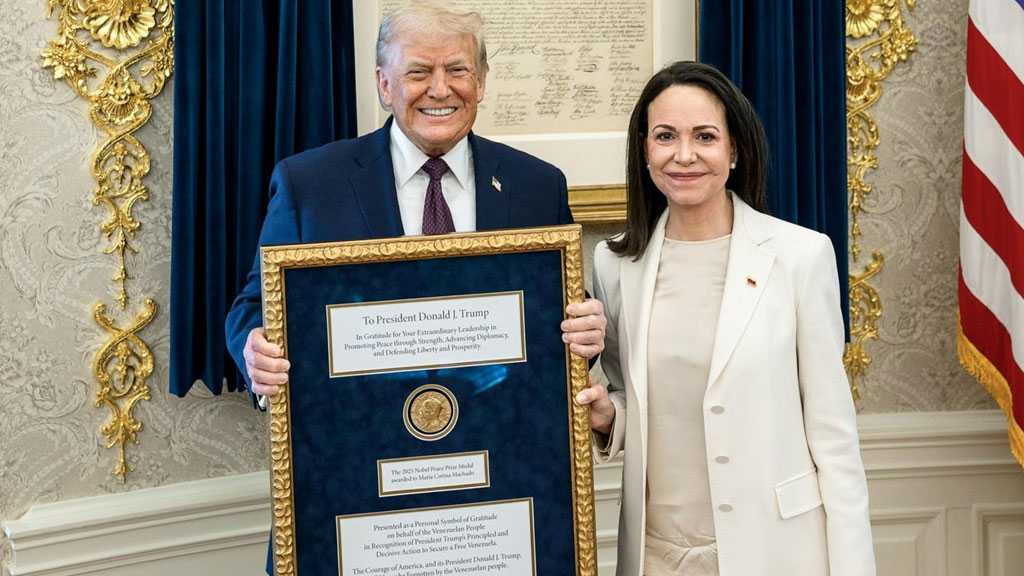 Venezuela’s Machado Symbolically Presents Trump with Nobel Peace Prize Medal at White House