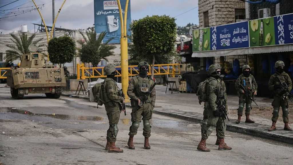 “Israeli” Forces Storm West Bank Camps, Prepare Demolitions Near Qalandia