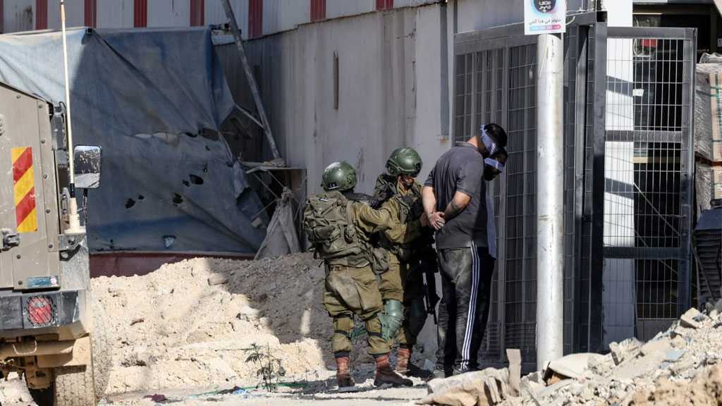 “Israeli” Forces Detain Dozens of Palestinians in Sweeping West Bank Raids